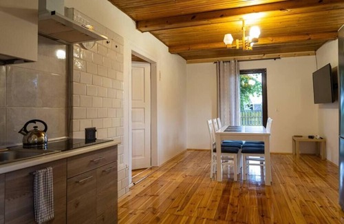 Zatory House | Cosy country house surrounded by a river, forests and meadows.