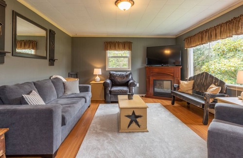 Deerfield House | Country home with cozy fireplace