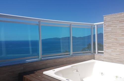 Conceicao de Jacarei Apartment | Coverage in Porto Real Suites with 3 suites, barbecue and hydromassage