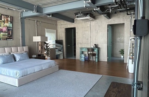 Nimman House | Cozy loft-style rooms, private baths, free Wi-Fi, A/C, and shared spaces.