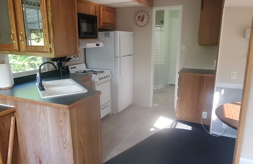 Alexandria House | Cozy 1-bdrm Glamping Trailer set in the woods of tranquil Alexandria - AC, WiFi