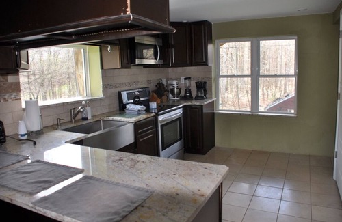 Mount Upton Apartment | Cozy 2 bed 2 bath apt. with porch, peaceful Riverfront in the NW Catskill area