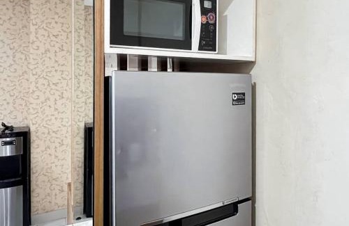 Cikarang Apartment | Cozy 2BR Apt Trivium Cikarang with Pool, Gym, WiFi by 2ndHome
