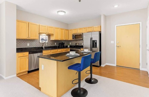 West Seventh Apartment | Cozy 2BR | King + 2 Queens + Walk to Xcel Arena