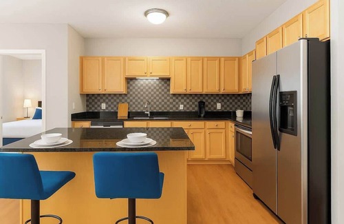 West Seventh Apartment | Cozy 2BR | King + 2 Queens + Walk to Xcel Arena