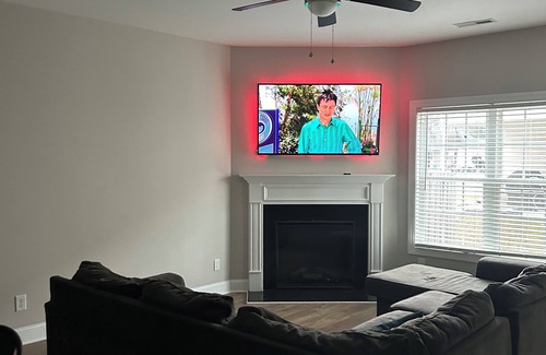 Greenville Condo | Cozy 2BR Retreat ,Gated Yard, Smart TVs & Coffee Bar!