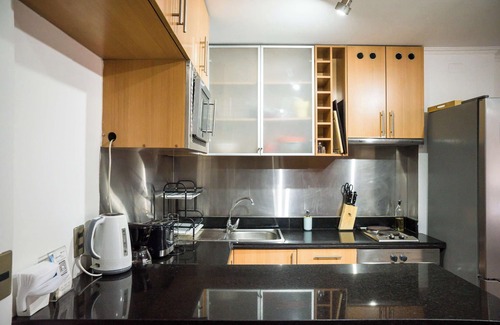 El Golf Apartment | Cozy 2BR Retreat in Prime Las Condes Location