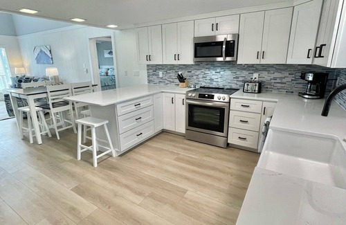 Ocean Isle Beach Cottage | Cozy 5BR-2BA Cottage on Canal, Private Heated Pool, Private Boat Dock