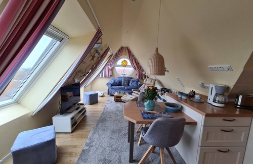 Norddeich Apartment | Cozy attic studio Norddeich panoramic window with sea view beach 50 meters