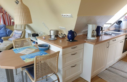 Norddeich Apartment | Cozy attic studio Norddeich panoramic window with sea view beach 50 meters