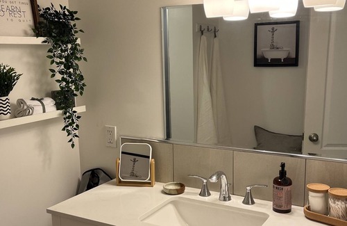 Cedarbrae House | Cozy basement suite w/fireplace. Pet friendly!