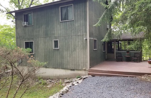 Bushkill Cabin | Cozy Cabin Escape with indoor & outdoor pools, hot tubs, tennis, skiing & more
