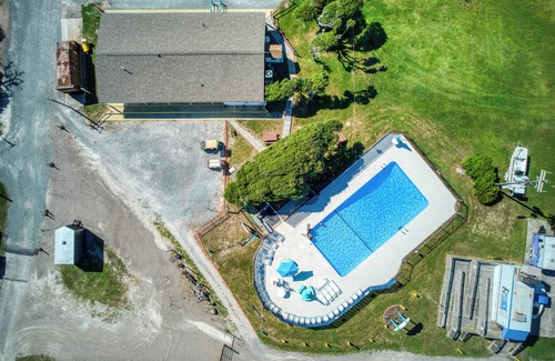 North Topsail Beach House | Cozy camper with outside kitchen & grill, pool and walking distance to the beach