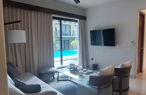 El Hujal Condo | Cozy condo with pool and palm shelter- 5 min from the beach!