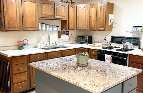 Gobles Cottage | Cozy Cottage Lakefront View - Paddle Board, Kayak, Hot Tub and more!