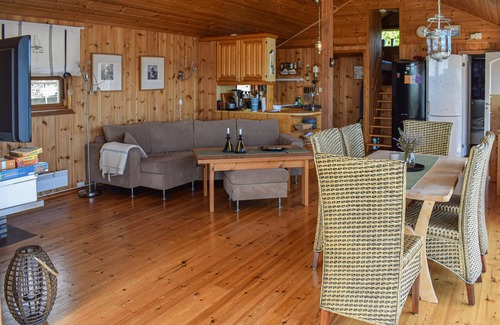 Stokke House | Cozy cottage with wood-burning stove and panoramic view of the fjord.