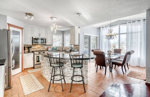 Shawnessy House | Cozy Family Friendly Home with Rec Room & Sauna!
