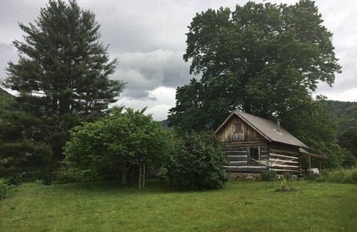 Barnardsville Cabin | Cozy Historic Cabin Retreat - visit trails right off of the farm. Pet Friendly.