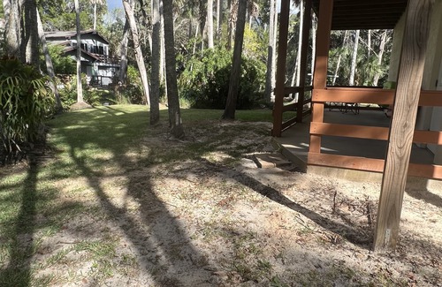 Brooksville House | Cozy home, beautiful views & swimming in a spring fed river among a wooded yard