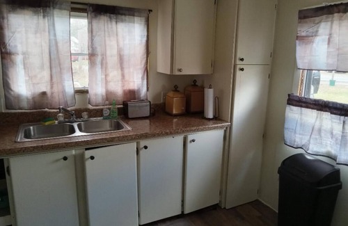 Wilton House | Cozy home tranquil wooded setting walking trails stream frontage in Wilton WiFi