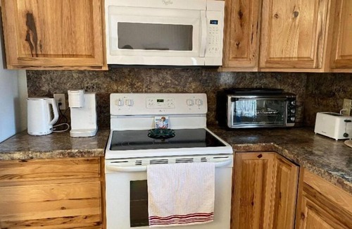 Wichita Falls Cottage | Cozy house, 3 miles from SAFB! Pet friendly with an outdoor seating area.