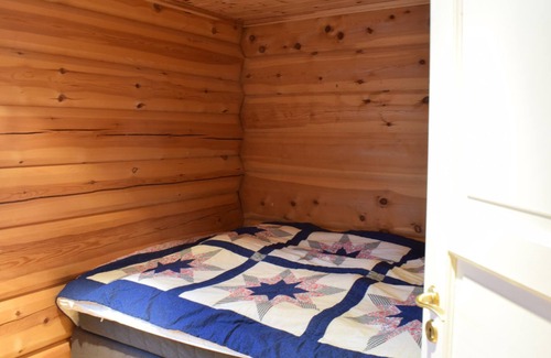 Tyinkrysset House | Cozy log cabin with sauna and mountain view.