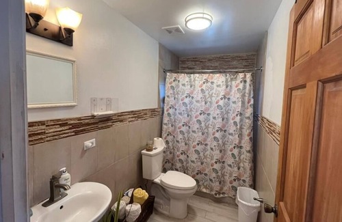 Rolleville Cottage | Cozy Ocean View Cottage near Beach (2 minute walk to beach)