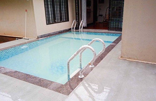Mananthavady Villa | Cozy riverside private pool Villa in Wayanad Kerala nnPet friendly