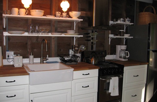 Suttons Bay Cottage | Cozy, Rustic Little Cottage In The Woods