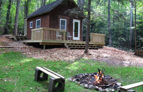 Suttons Bay Cottage | Cozy, Rustic Little Cottage In The Woods
