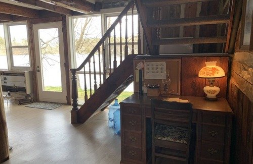 Frontenac Cottage | Cozy rustic log cottage with small private beach, 3 fireplaces and lots of space