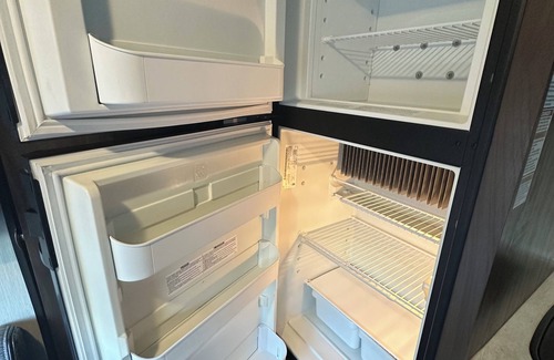 Courier City - Oscawana House | Cozy RV in Tampa, Hyde Park area with WiFi, AC. Close to UT, downtown.