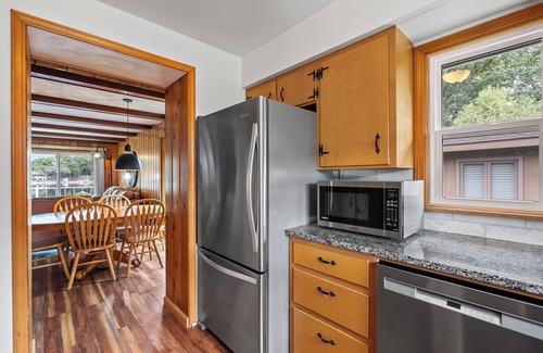 Kendall Cottage | Cozy Spotless Lake Cottage- Flowers Galore, Sandy Beach, Gorgeous Sunsets