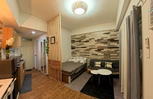 Mactan Export Processing Zone Apartment | Cozy studio in Mactan Lapu-lapu City with fitness room, pool, WiFi, etc