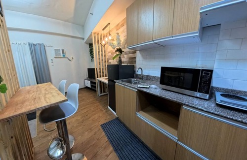 Mactan Export Processing Zone Apartment | Cozy studio in Mactan Lapu-lapu City with fitness room, pool, WiFi, etc