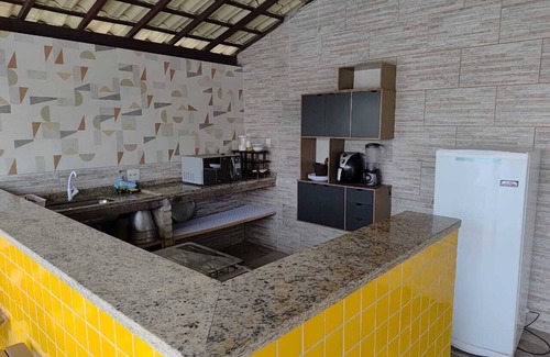 Barra Nova Villa | Cozy suite with a view of the space, air conditioning, minibar and smart TV