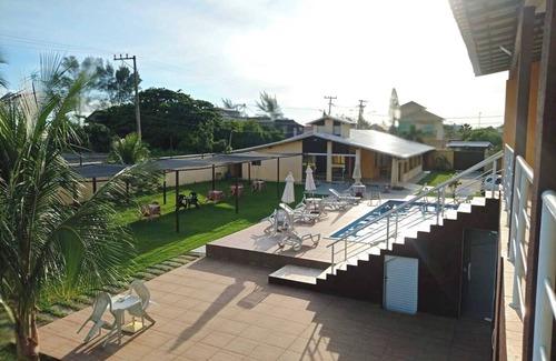 Barra Nova Villa | Cozy suite with a view of the space, air conditioning, minibar and smart TV