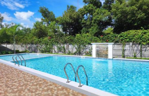 Talisay Apartment | Cozy TriG Place near SM Seaside with Wifi Netflix free swimming pool & parking