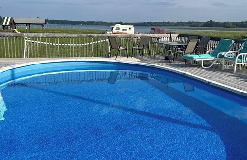 Nipissing Cabin | Cozy two bedroom cabin shores of Lake Nipissing. Enjoy the pool and lake views.