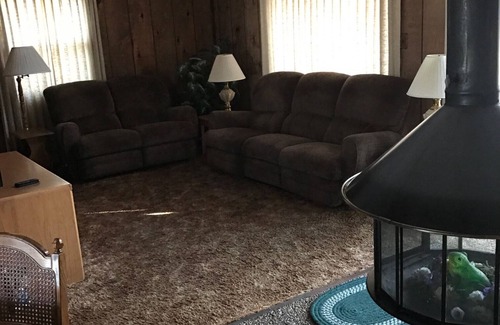 Lakewood House | Cozy vacation home nestled in a quiet wooded area. Near town but private
