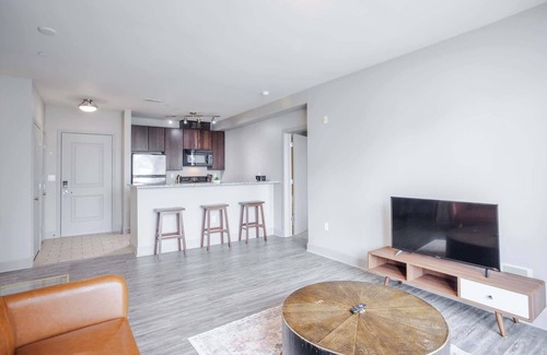 Central Business District Apartment | CozySuites at the Banks gym, pool 12