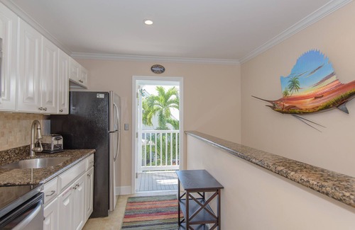 Truman Annex Condo | Craig & Cindy Key West Truman Annex Shipyard Condo with balcony at Mile Marker 0