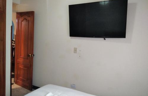Tunja House | Cuarto Cama King Smart TV en apartamento atico Tunja