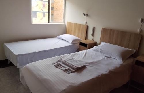 Tunja House | Cuarto Cama King Smart TV en apartamento atico Tunja