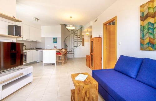 Muchamiel Apartment | Daylight friendly apartment with sea view and shared outdoor pool.