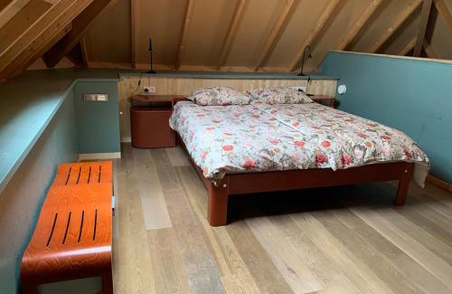 Ammerzoden Bed & Breakfast | De Rooie Hooimijt