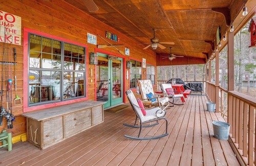 Higden Cabin | Deck & Fire Pit: Waterfront Cabin in Greers Ferry!
