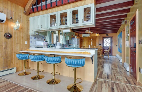 Vernon Apartment | Deck, Mountain Views: Colorful Retreat in Vernon!