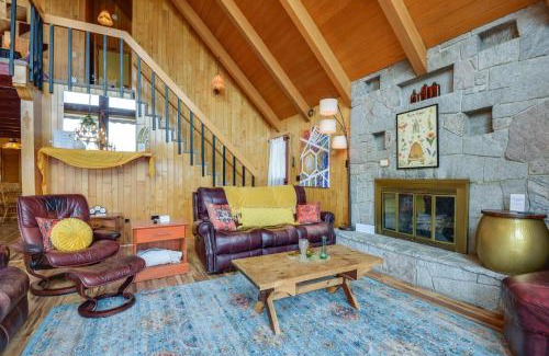 Vernon Apartment | Deck, Mountain Views Colorful Retreat in Vernon!