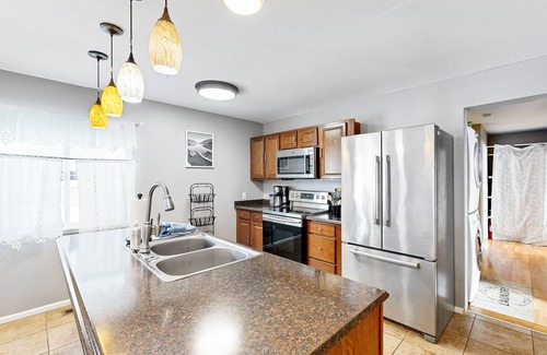 Northeast Anchorage House | Delightful mountain-view retreat with spacious deck & jetted tub - dog-friendly